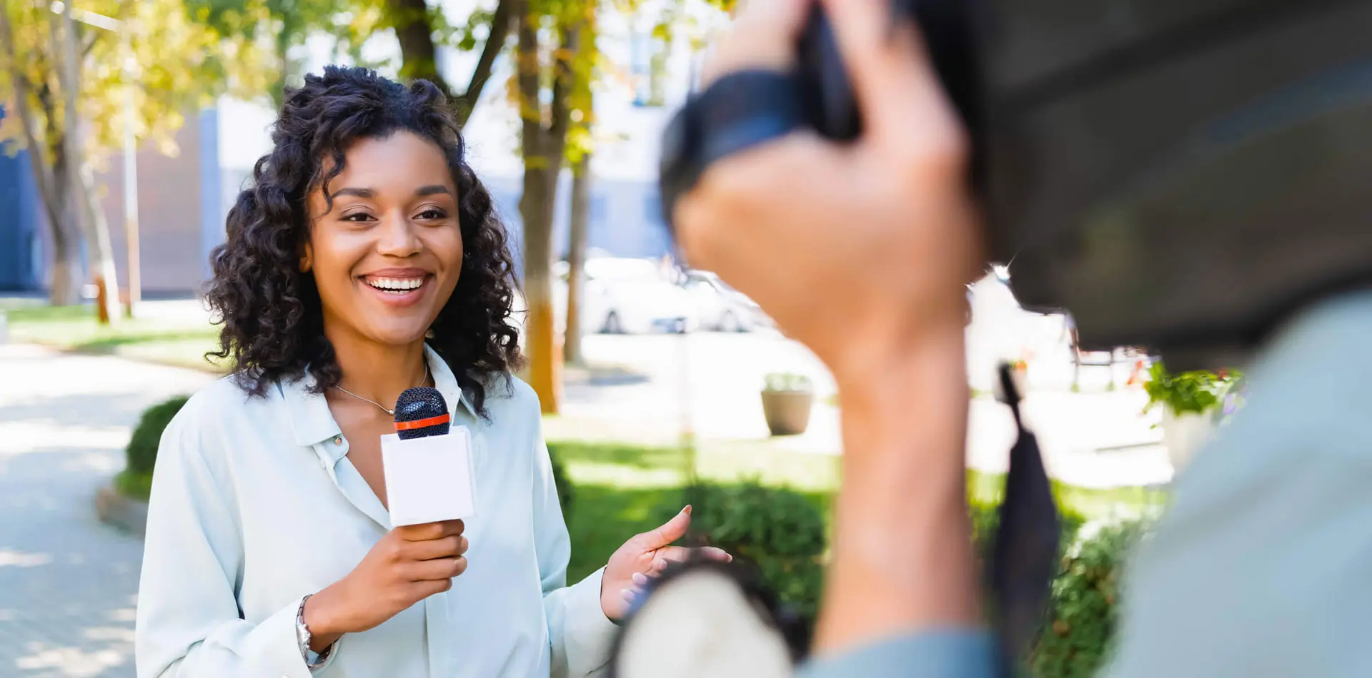 Regent University journalism student giving a news anchor report