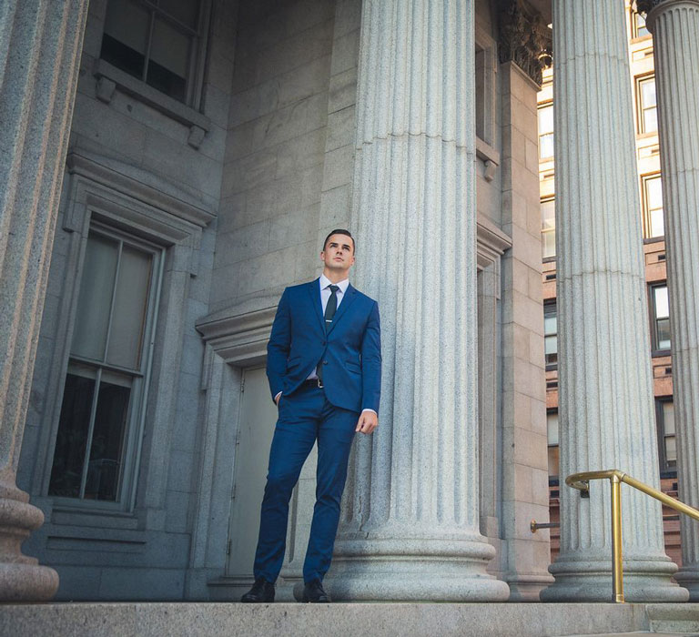 Professional standing outside a courtroom
