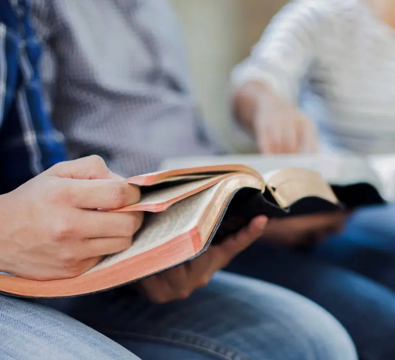 Regent students reading the Bible