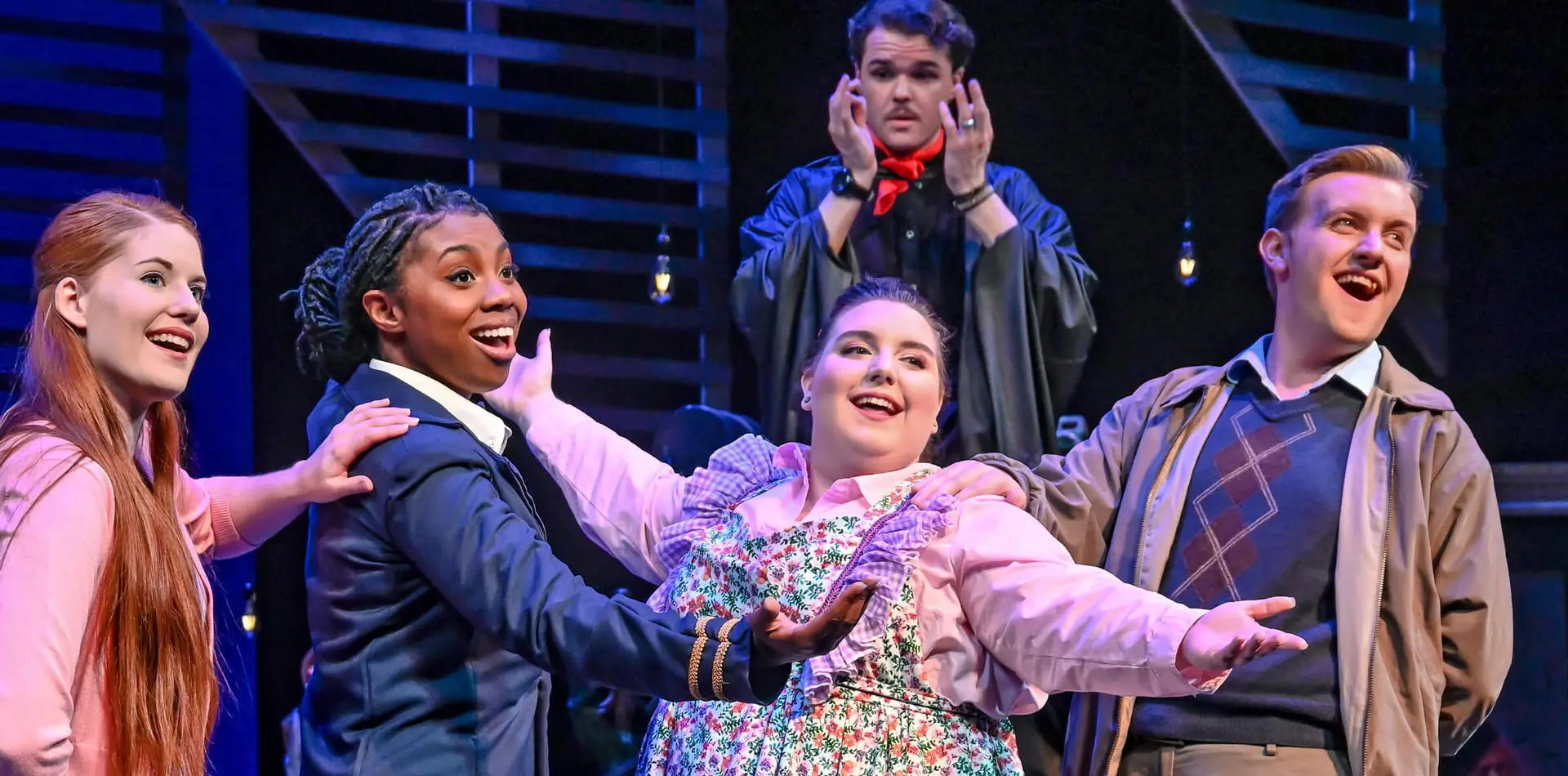 Regent students acting in a theatre show.