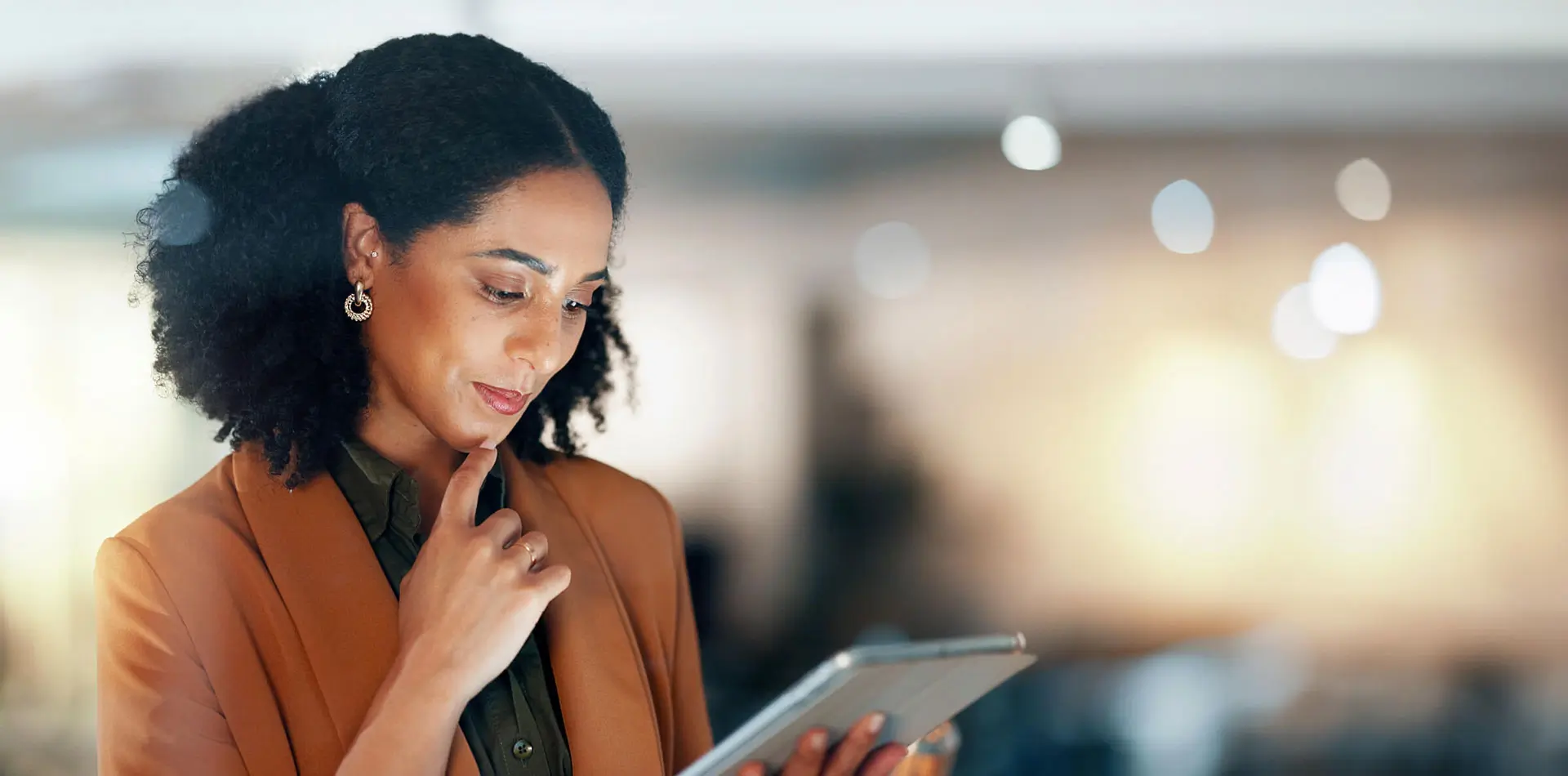 A psychologist looking at her tablet.