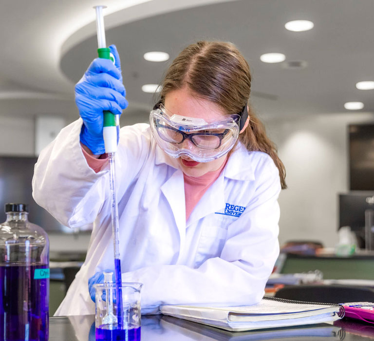 teaching-biology-secondary-education-explore-desktop Science teacher experimenting in a lab